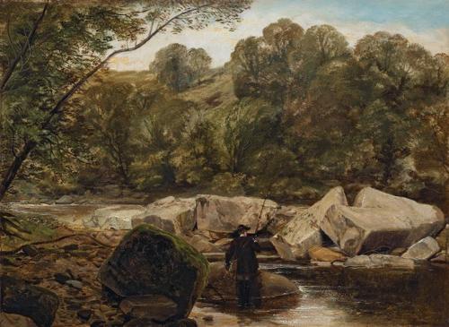 {'en': 'An angler by the rocks in a river landscape with trees'}