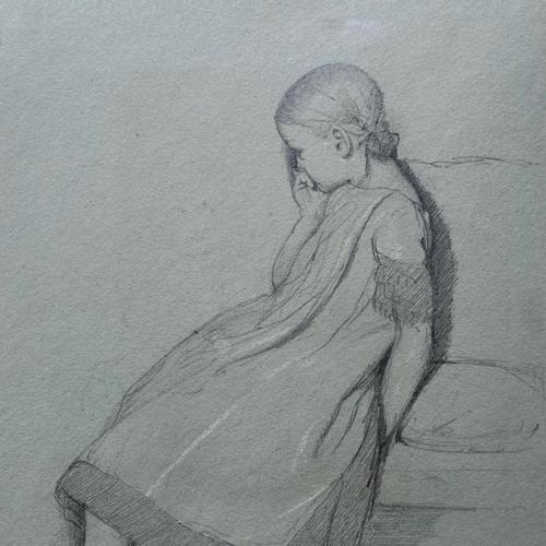 {'en': 'A girl lost in thought'}